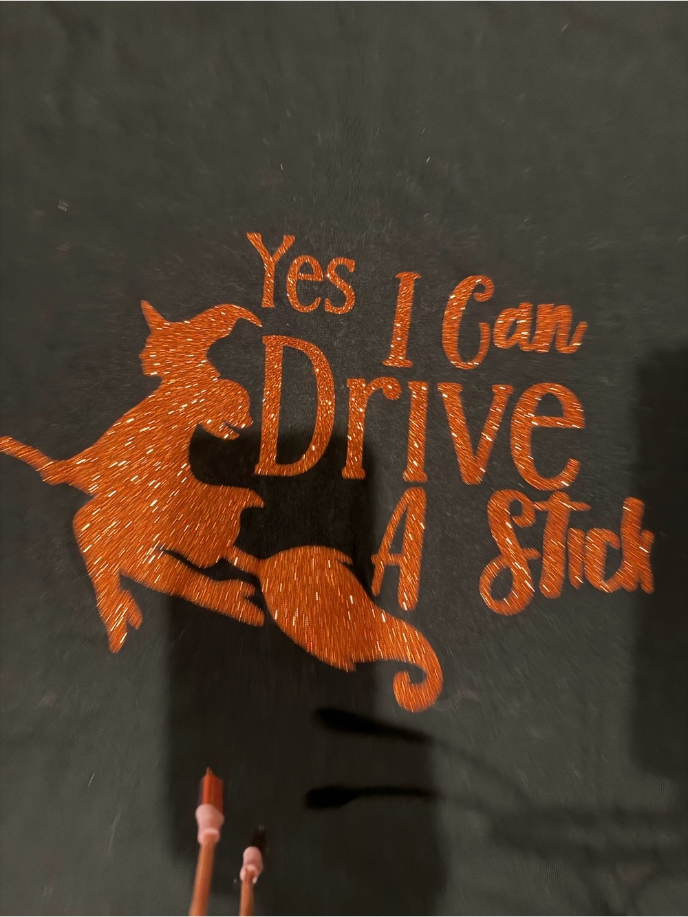 George Black Top with Orange Glitter 'Yes I Can Drive A Stick' Graphic